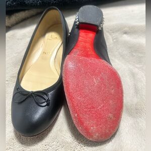 Christian Louboutin spiked flats.  Size 38